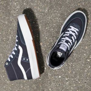 Vans Men's Black and White High-Top Sneakers